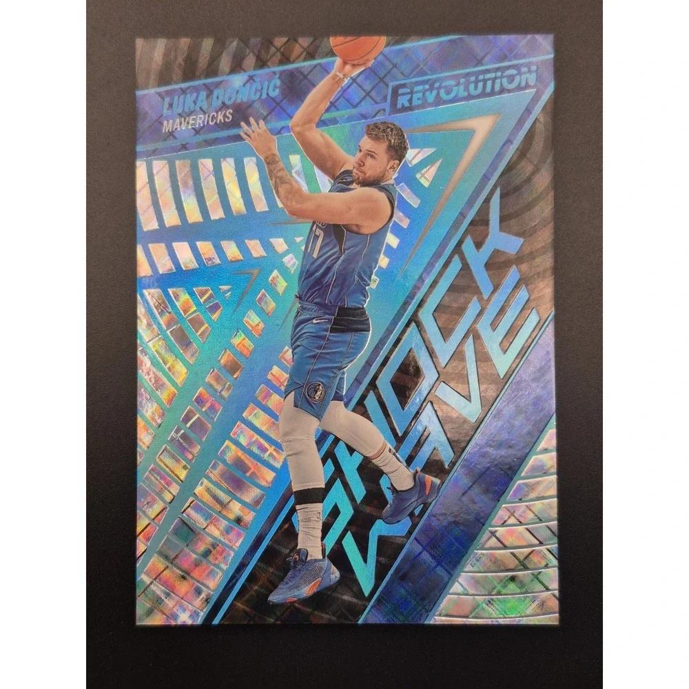 2022-23 Panini Revolution Luka Dončić #3 ‎ Shockwave Cosmic Blue /99 Mavs Lakers